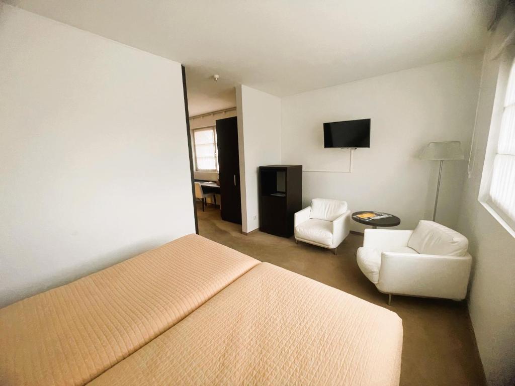 Chambre supérieure double avec coin salon